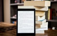 eBook is standing next to the traditional books